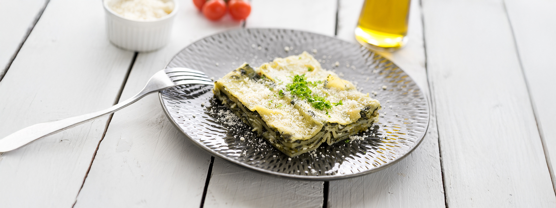 Porzione di lasagne fredde al pesto